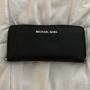 Michel Kors zip around wallet